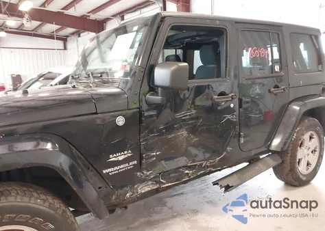 2011 Jeep Wrangler Unlimited Sahara from USA, damaged, VIN 1J4HA5H11BL533237